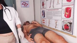 The doctor checked the patient’s condition with his tongue in a fake hospital setting