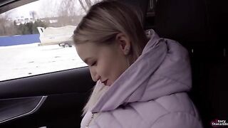 A cute girl is having sex with a taxi driver in the car